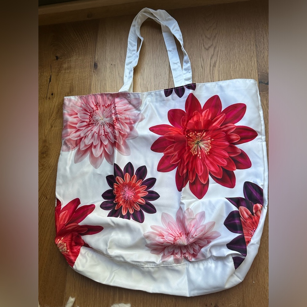 Clarins floral tote bag pink red purple with a small carrying bag